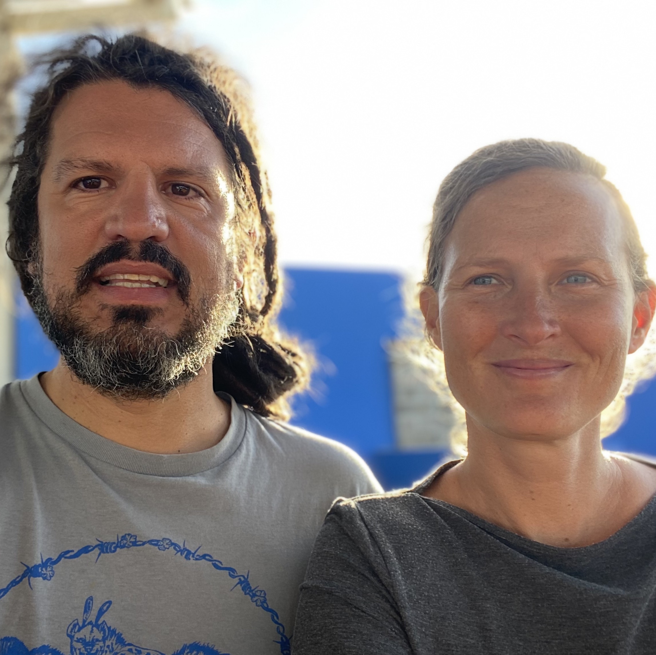 A man with a brown beard and mustache next to a woman with salt and peper coloured heair